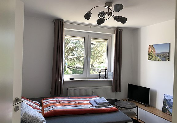 5Wohnzimmer mit Schlafsofa