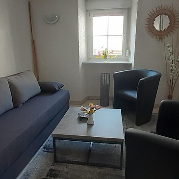 Aufenthaltsraum mit Schlafsofa