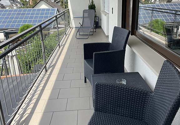 Balcony with lounge and sunlounger
