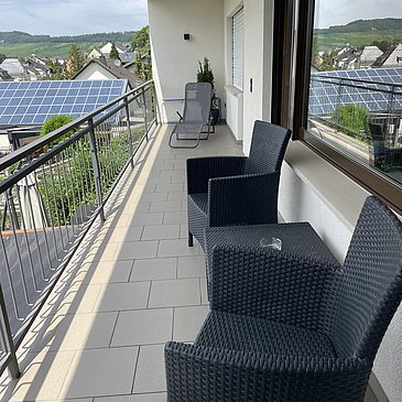 Balcony with lounge and sunlounger